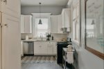 The West Kitchen is a Chef`s Dream with Spacious Countertops and Modern Appliances for Whipping Up Family Feasts